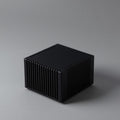 Voltage Node Pro fanless mini PC with black heatsink chassis
